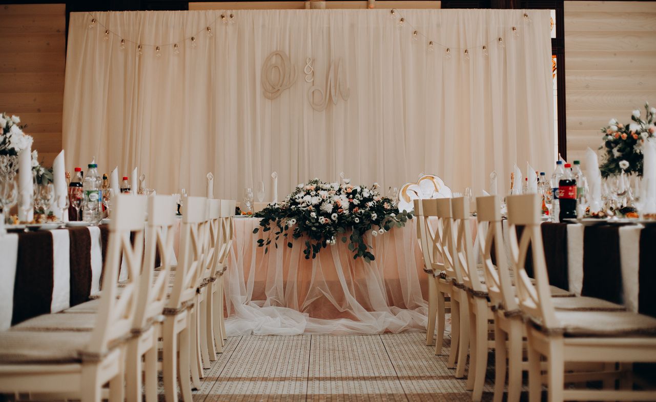 About Beautiful and elegant wedding setup featuring floral arrangements, classy chairs, and a serene atmosphere.